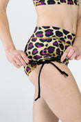 Load image into Gallery viewer, Side Tie Short // Gold + Purple Leopard
