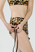 Load image into Gallery viewer, Side Tie Short // Gold + Tan Leopard
